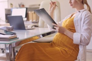 Surrogate-filing-documents-and-researching- Surrogacy Law